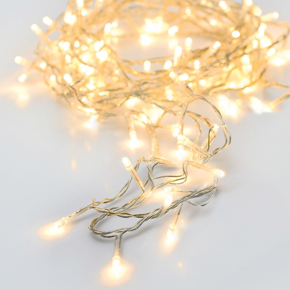 Grinalda a pilhas multifunções 96 leds branco quente cabo transparente IP44 7,5m